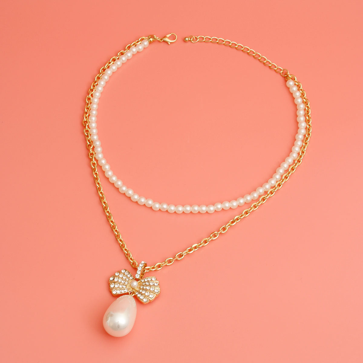 Double Layer Pearl Bow Gold Necklace|16 inches - Premium Wholesale Jewelry from Pinktown - Just $17! Shop now at chiquestyles
