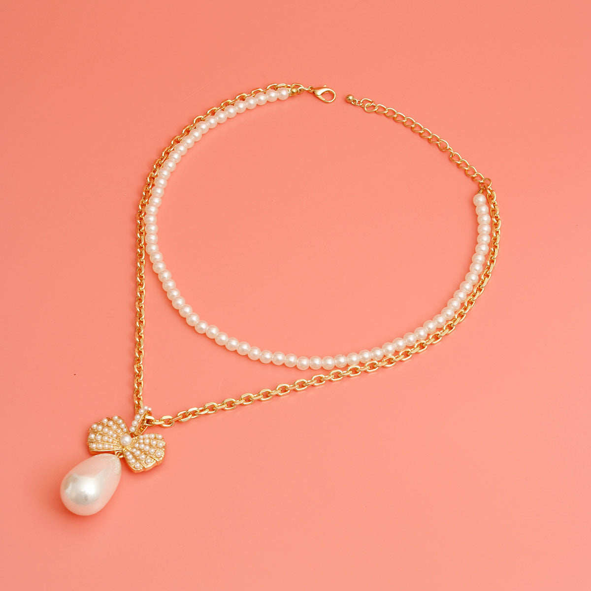 Double Layer Pearl Bow Necklace|16 inches - Premium Wholesale Jewelry from Pinktown - Just $17! Shop now at chiquestyles