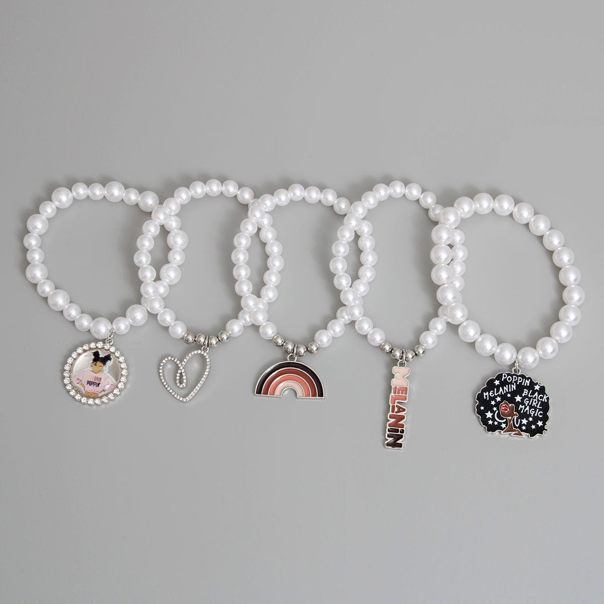 White Melanin Poppin Bracelets|Stretch to Fit - Premium Wholesale Jewelry from Pinktown - Just $22! Shop now at chiquestyles