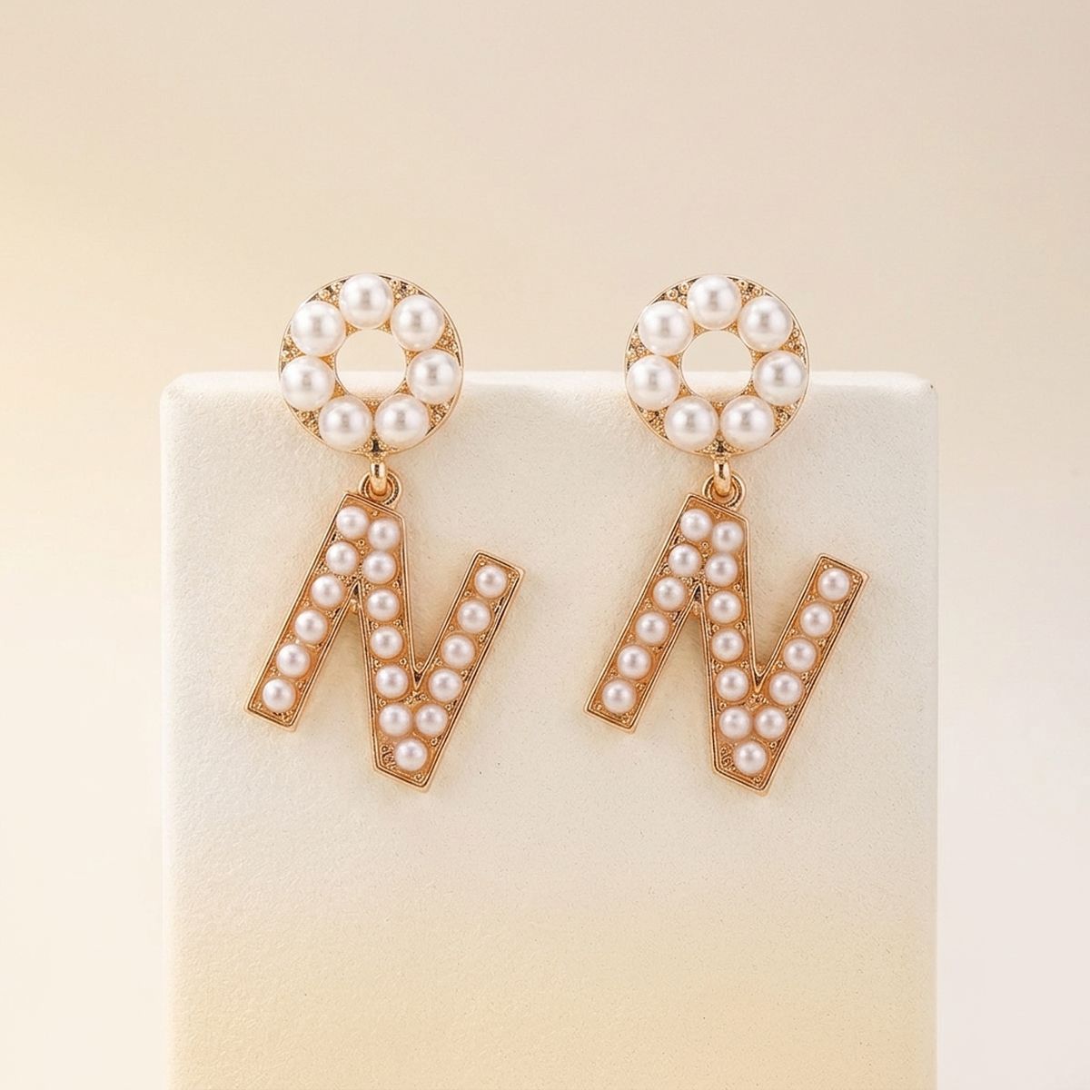 Creamy Comfort: Dangling N Earrings