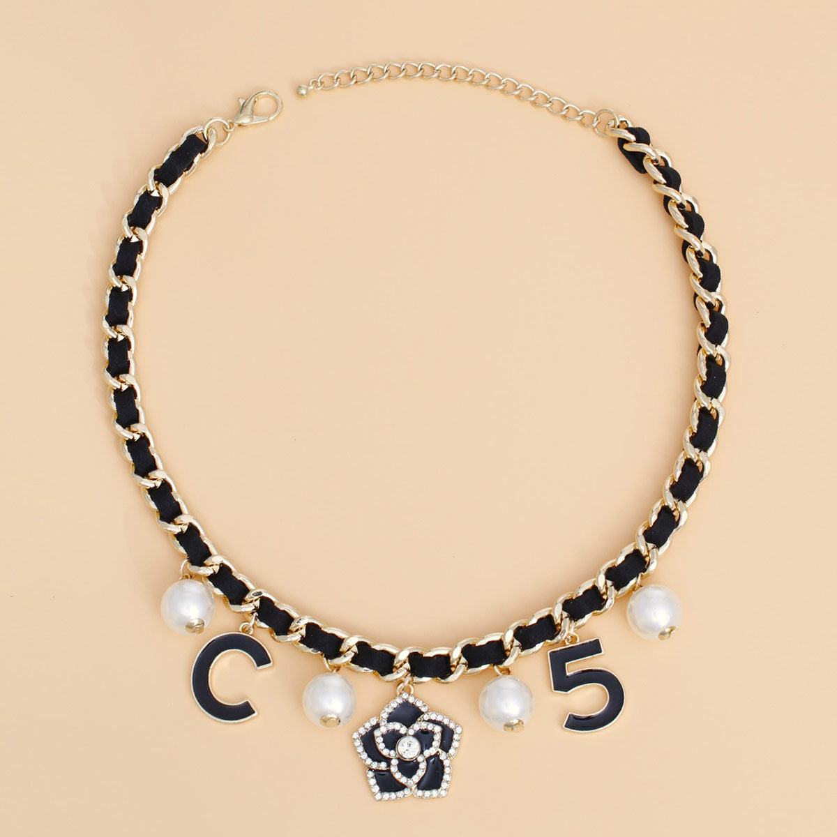 Gilded Glamour: The Camellia Charm Necklace - Premium Wholesale Jewelry from Pinktown - Just $17! Shop now at chiquestyles