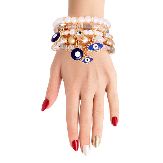 Cream Pearl Bead Evil Eye Bracelets|Stretch to Fit - Premium Wholesale Jewelry from Pinktown - Just $13! Shop now at chiquestyles