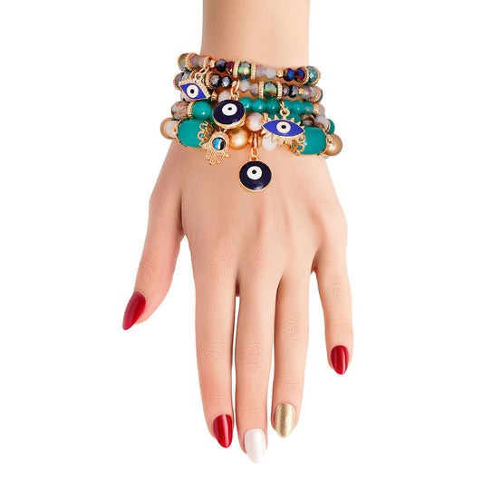 Turquoise Glass Bead Evil Eye Bracelets|Stretch to Fit - Premium Wholesale Jewelry from Pinktown - Just $13! Shop now at chiquestyles