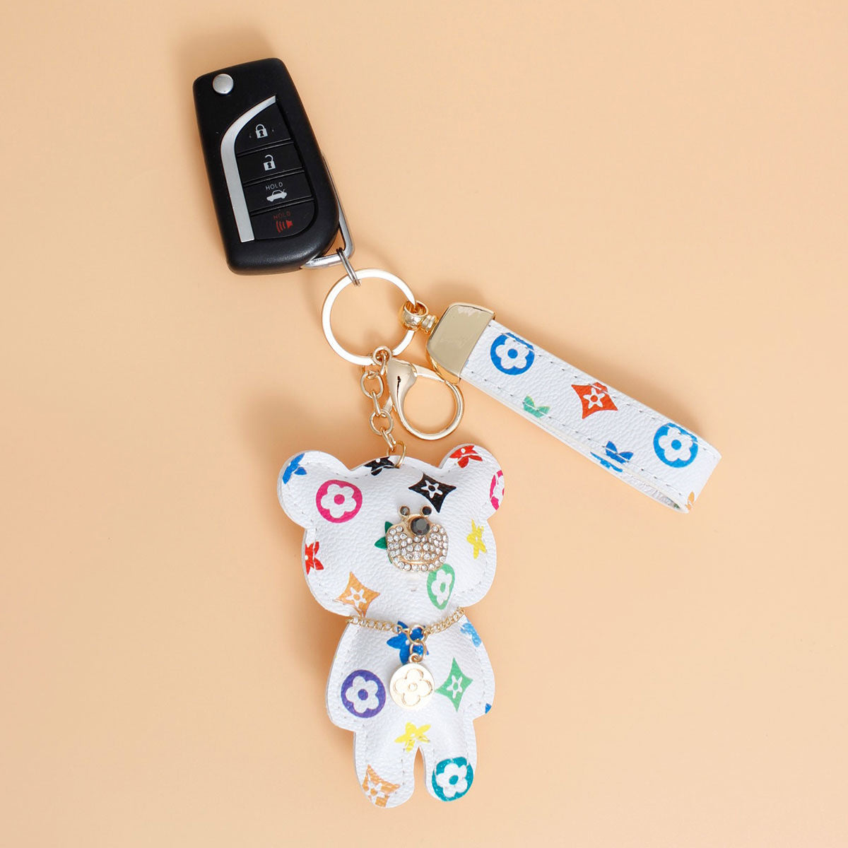 White Teddy Charm Keychain - Premium Wholesale Fashion Accessories from Pinktown - Just $10! Shop now at chiquestyles