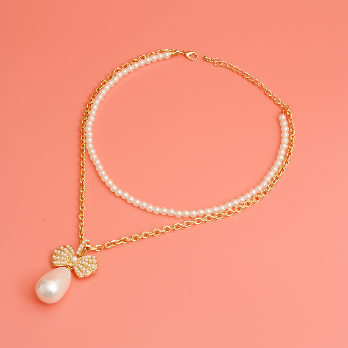 Double Layer Pearl Bow Necklace - Premium Wholesale Jewelry from Pinktown - Just $17! Shop now at chiquestyles