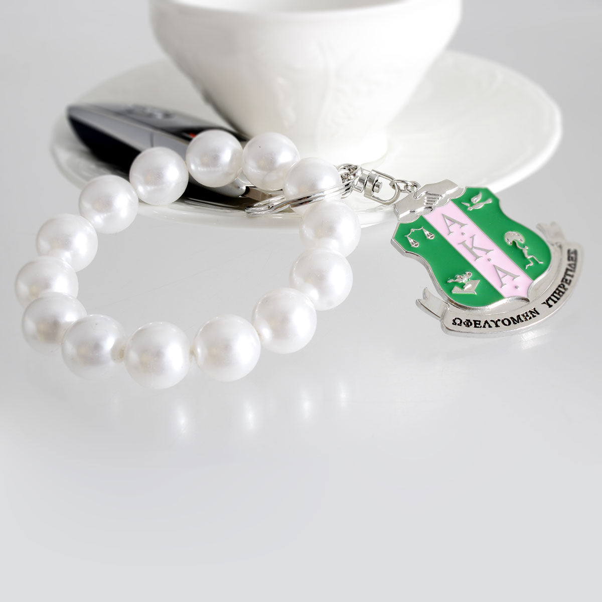 White Pearl Shield Keychain|7 x 2 inches - Premium Wholesale Fashion Accessories from Pinktown - Just $16! Shop now at chiquestyles