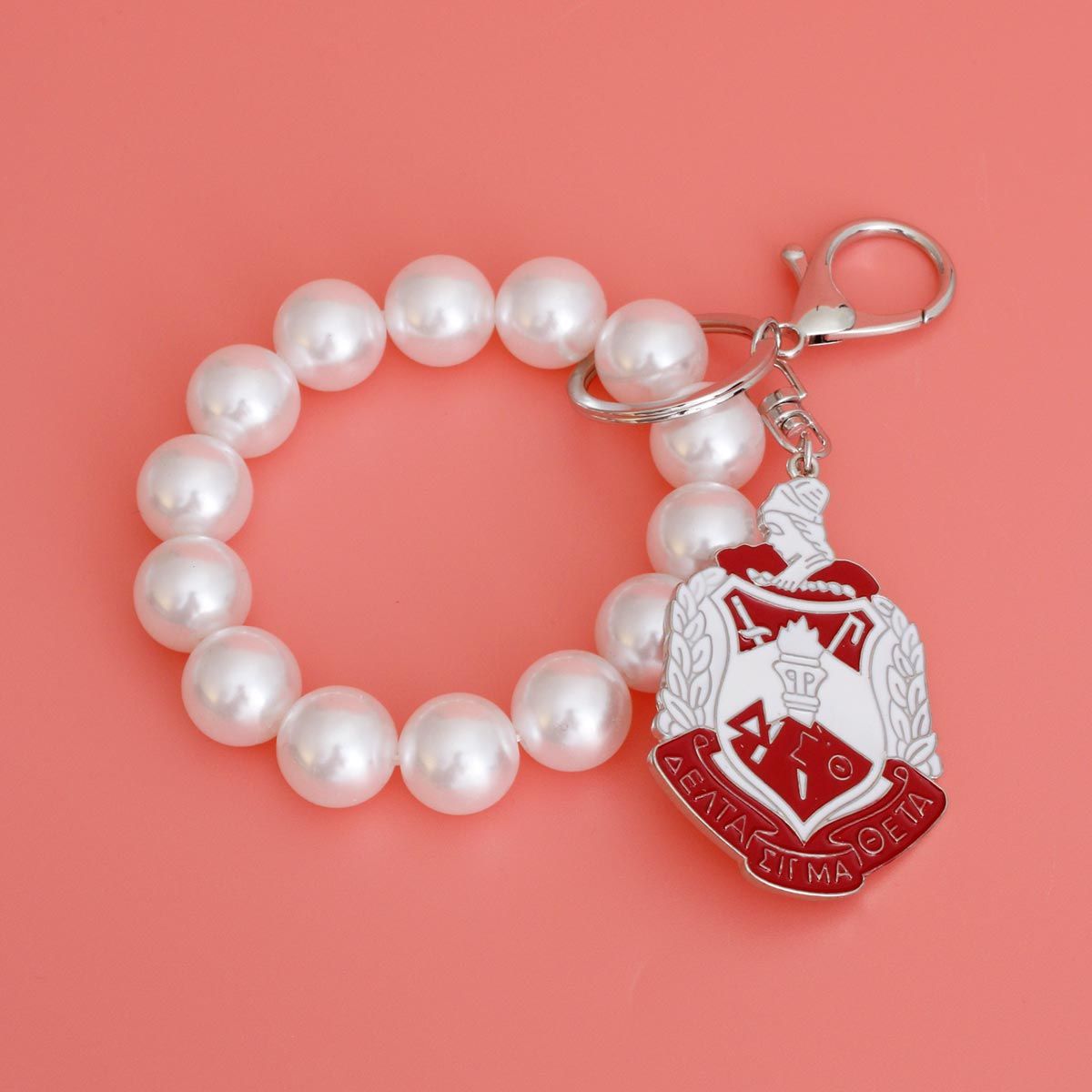 White Red Shield Pearl Keychain|7.75 x 1.65 inches - Premium Wholesale Fashion Accessories from Pinktown - Just $18! Shop now at chiquestyles
