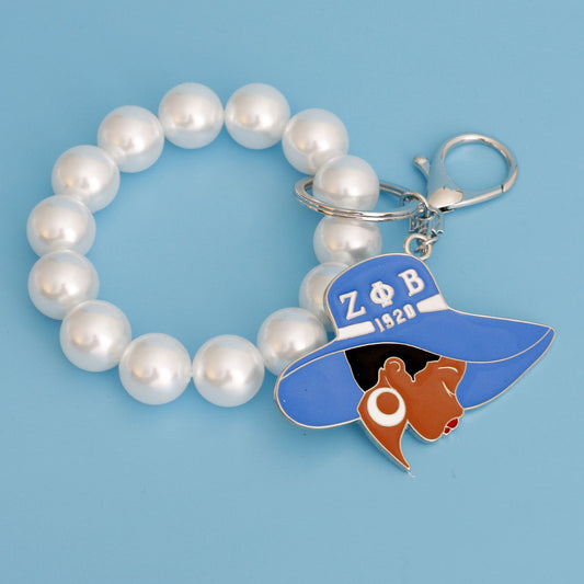 Blue White Hat Pearl Keychain - Premium Wholesale Fashion Accessories from Pinktown - Just $17! Shop now at chiquestyles
