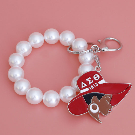 Red White Hat Pearl DST Keychain|7.25 x 2.75 inches - Premium Wholesale Fashion Accessories from Pinktown - Just $18! Shop now at chiquestyles