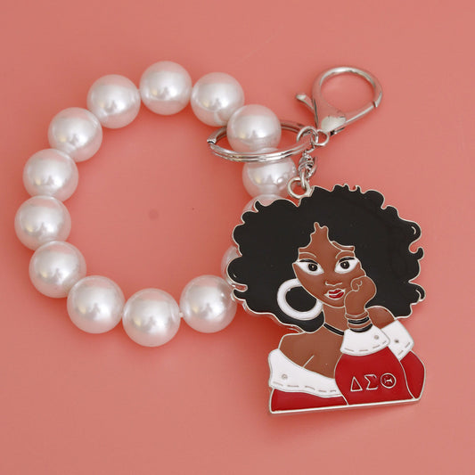 Red White Woman Pearl DST Keychain|7.85 x 2.25 inches - Premium Wholesale Fashion Accessories from Pinktown - Just $19! Shop now at chiquestyles