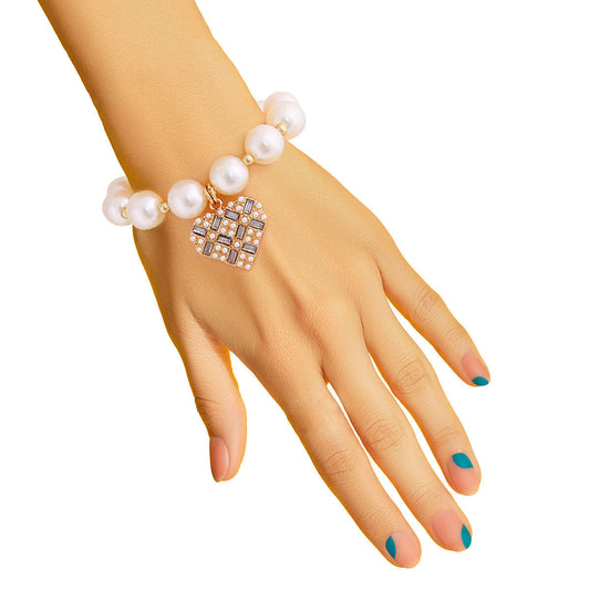 Cream Pearl Stone Heart Bracelet|Stretch to Fit - Premium Wholesale Jewelry from Pinktown - Just $9! Shop now at chiquestyles